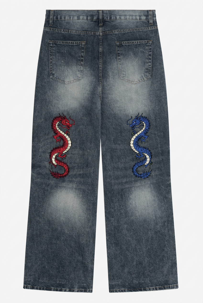 A pair of faded blue denim jeans shown from the back, featuring embroidered red and blue dragon motifs on the upper back pockets.