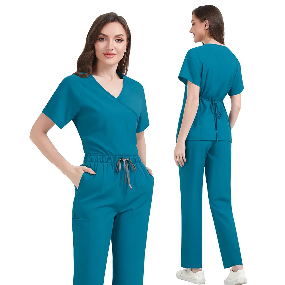 Teal medical scrubs set on a white background