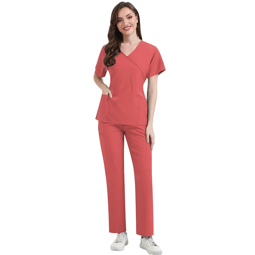 Woman wearing a red scrub set on a white background