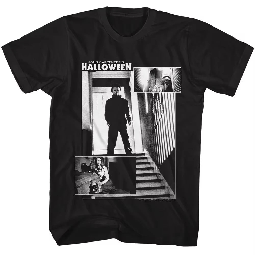 A black short-sleeve crewneck t-shirt featuring a large black-and-white graphic print from the movie 'Halloween' on the front, displayed against a solid white background.