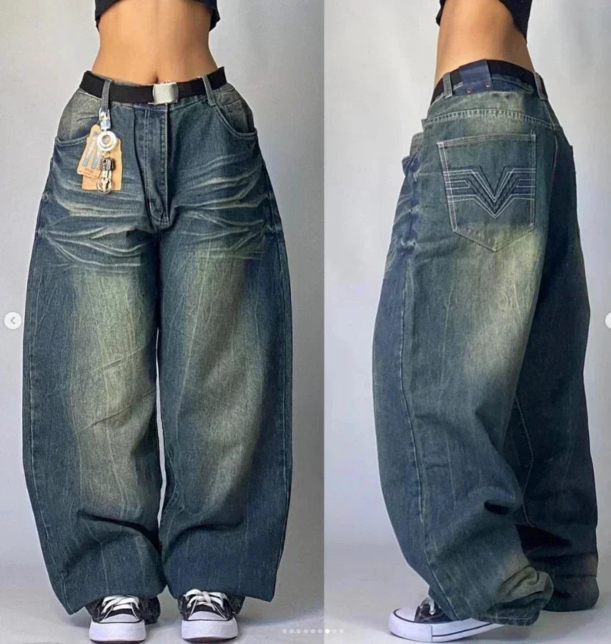 Pair of baggy jeans shown from front and side views on a plain background