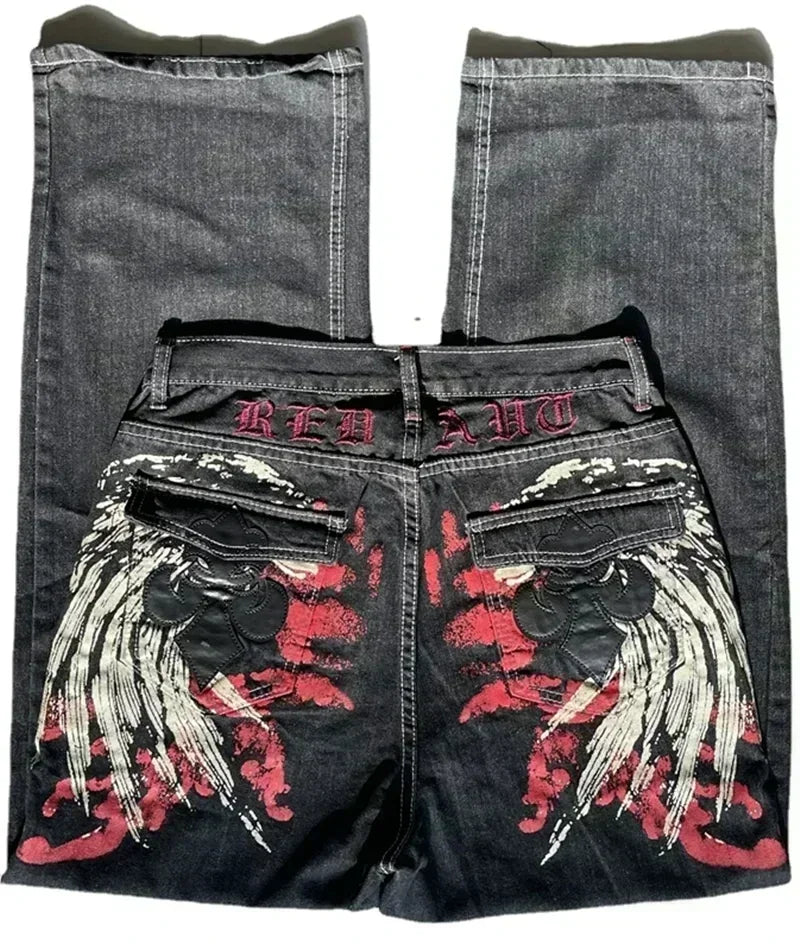 Black jeans with red and white designs on a white background