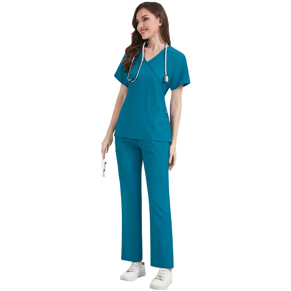 Person wearing a teal medical scrub set on a white background