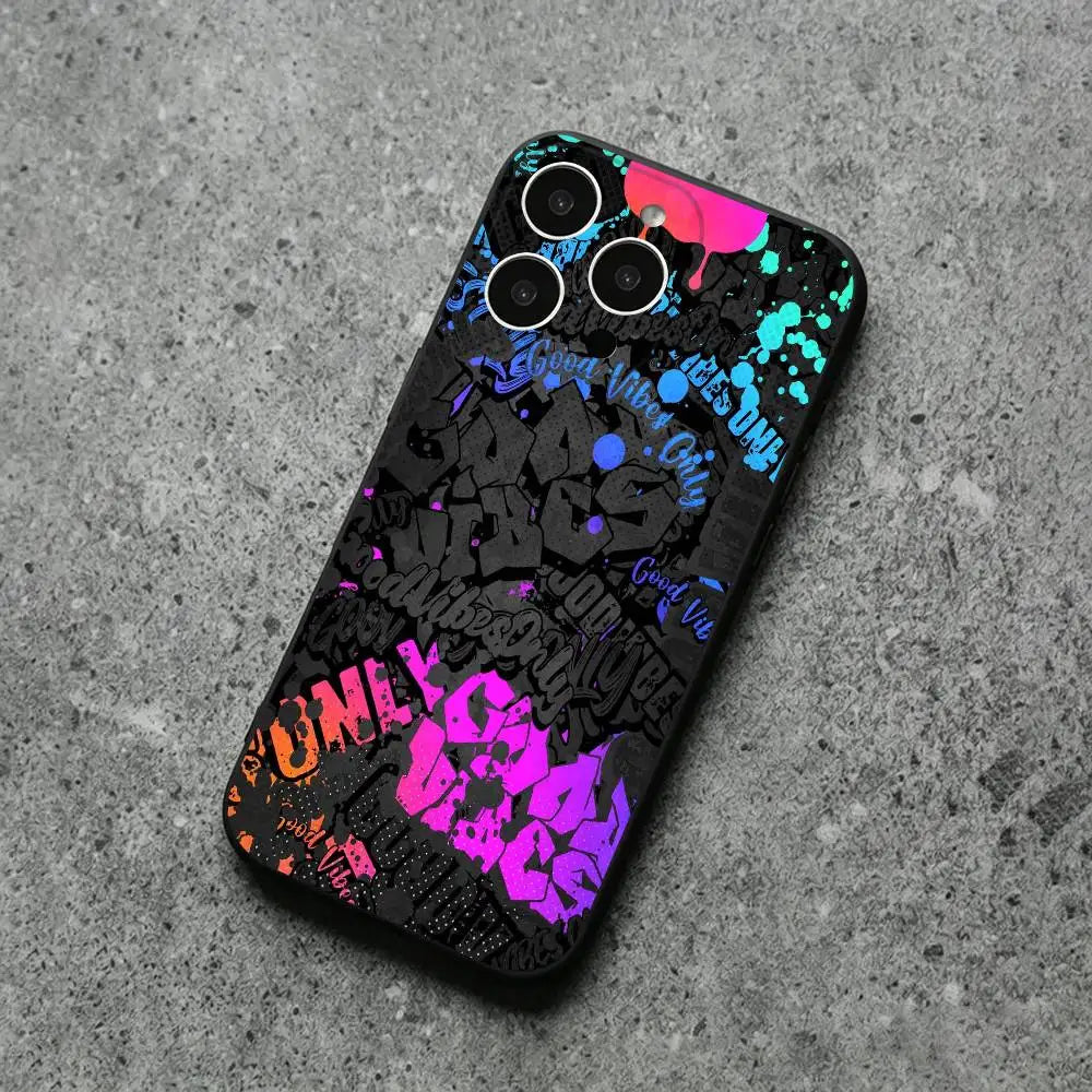A black phone case with a vibrant graffiti-style graphic print in pink, purple, blue, and orange, shown on a gray concrete-textured background.