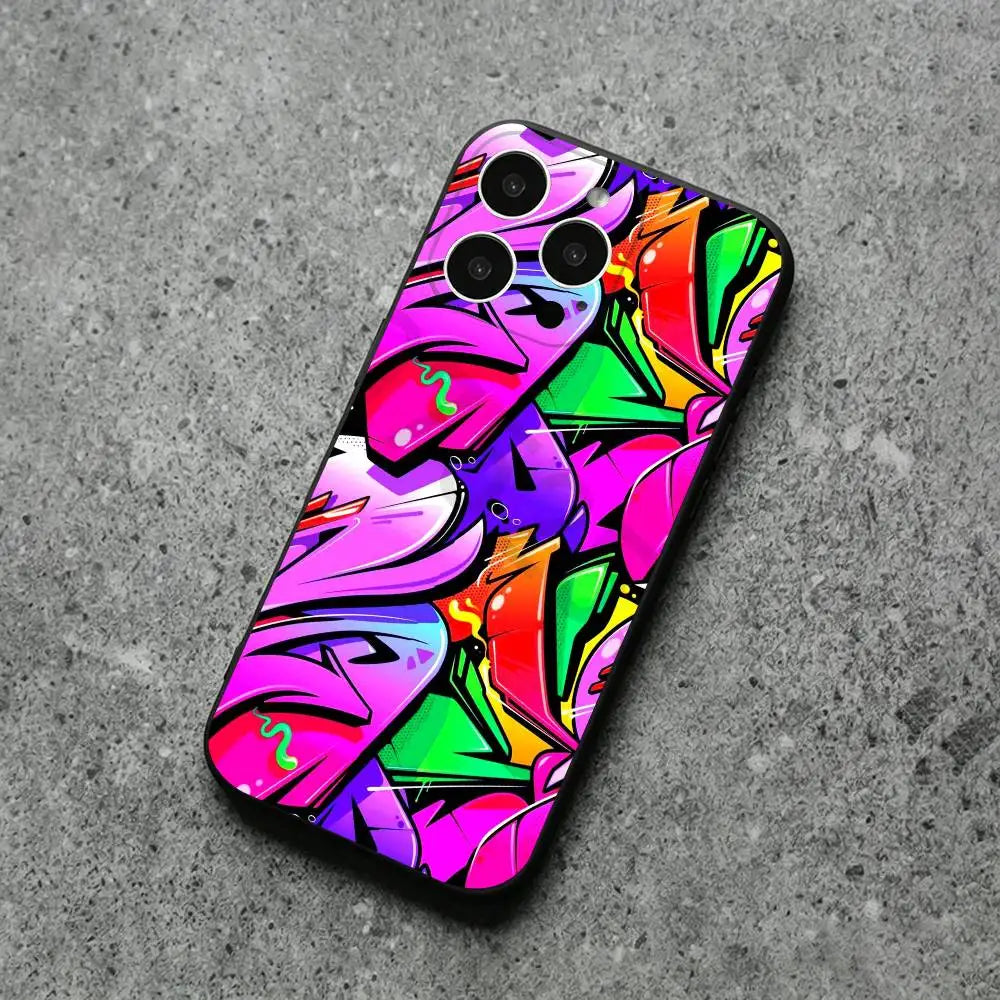 A phone case with a vibrant graffiti-style abstract design in pink, purple, green, orange, and yellow, shown on a gray textured surface.