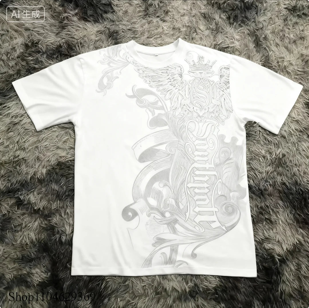 White t-shirt with black graphic design on a textured gray surface