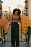 Black woman brown fire escape
