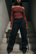 Claret shirt on a Black model in a stairwell