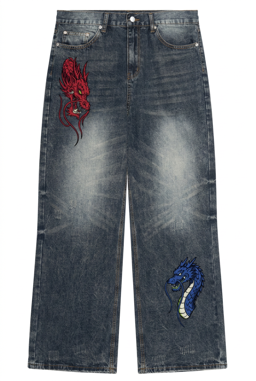 A pair of dark blue acid-wash jeans with embroidered dragon motifs on the left thigh in red and on the right thigh in blue and white.