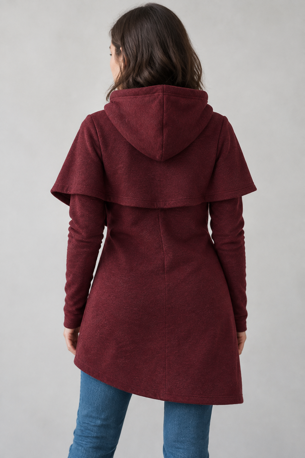 Wine red asymmetric hoodie back view showing hood and curved hem