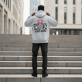 Male model wearing the light gray Men's Unltd. Graffiti Hoodie from behind on city steps