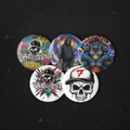 Five Vault-Seven graphic pin buttons displayed on a deep black background with subtle red and cyan lighting